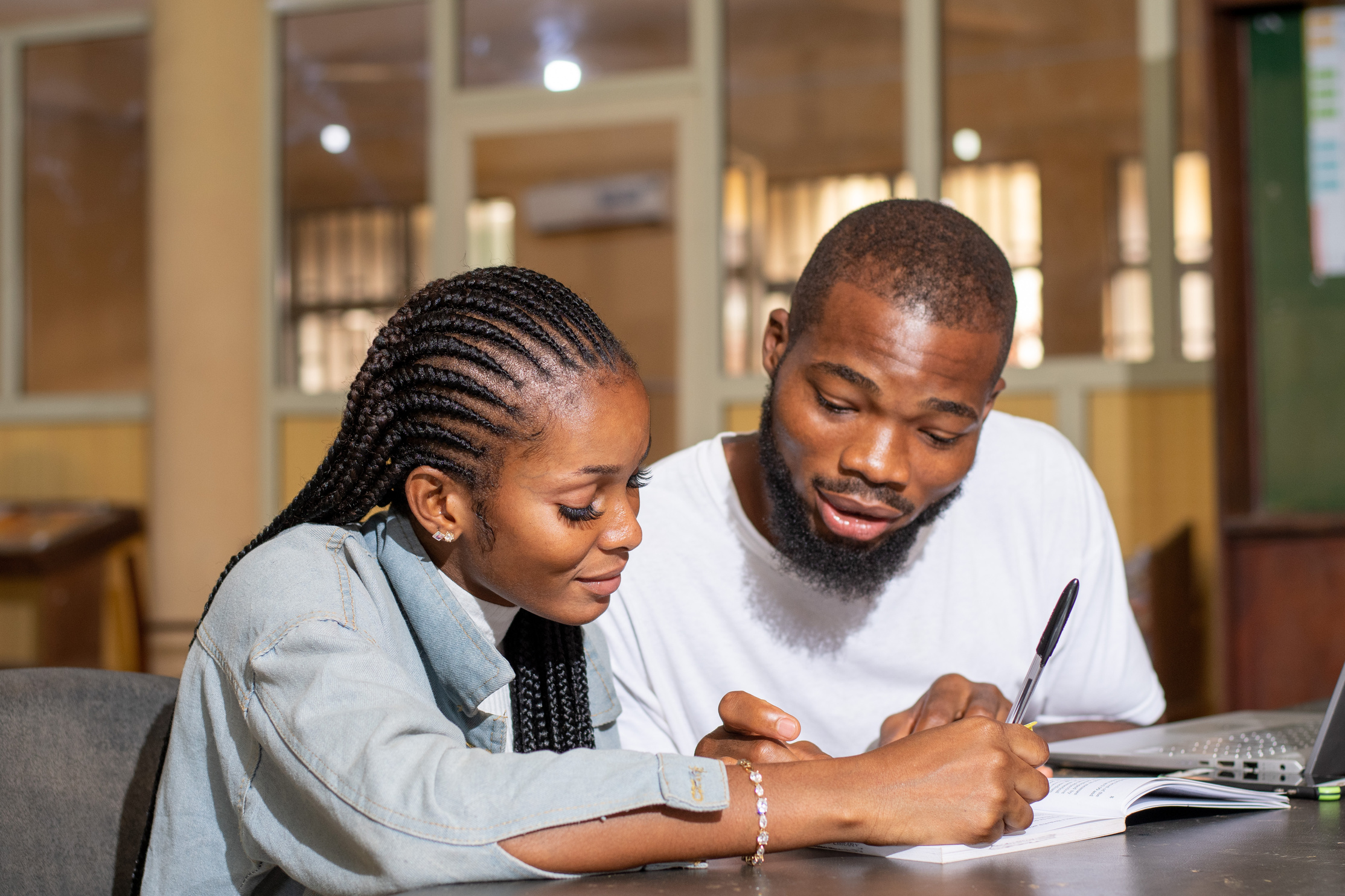 two african students study together